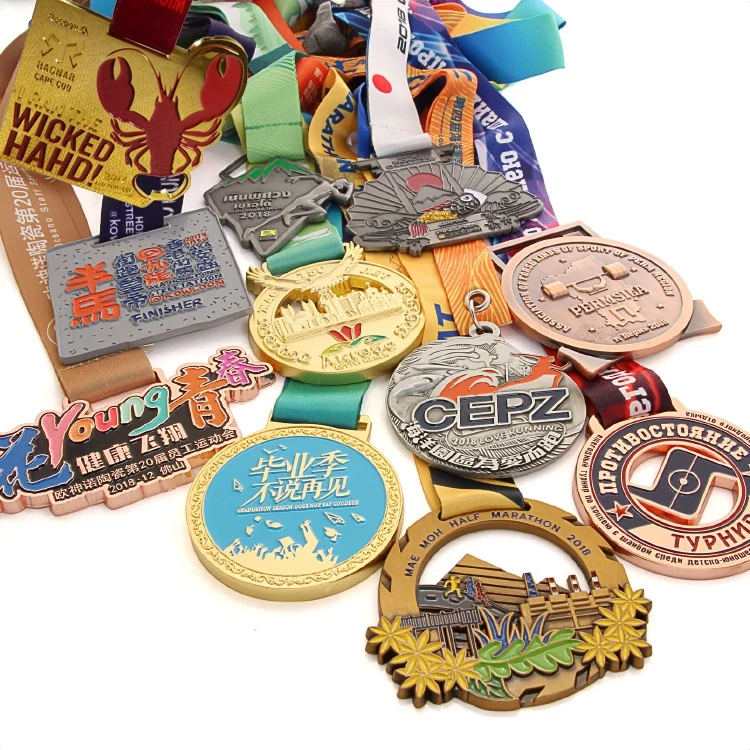 A selection of custom die-cast medals in various shapes and finishes